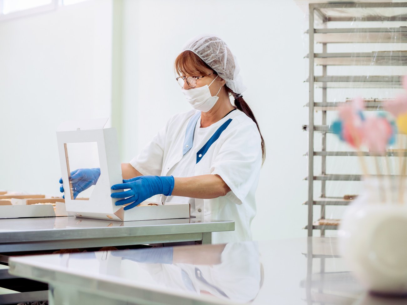 Worker in food production factory