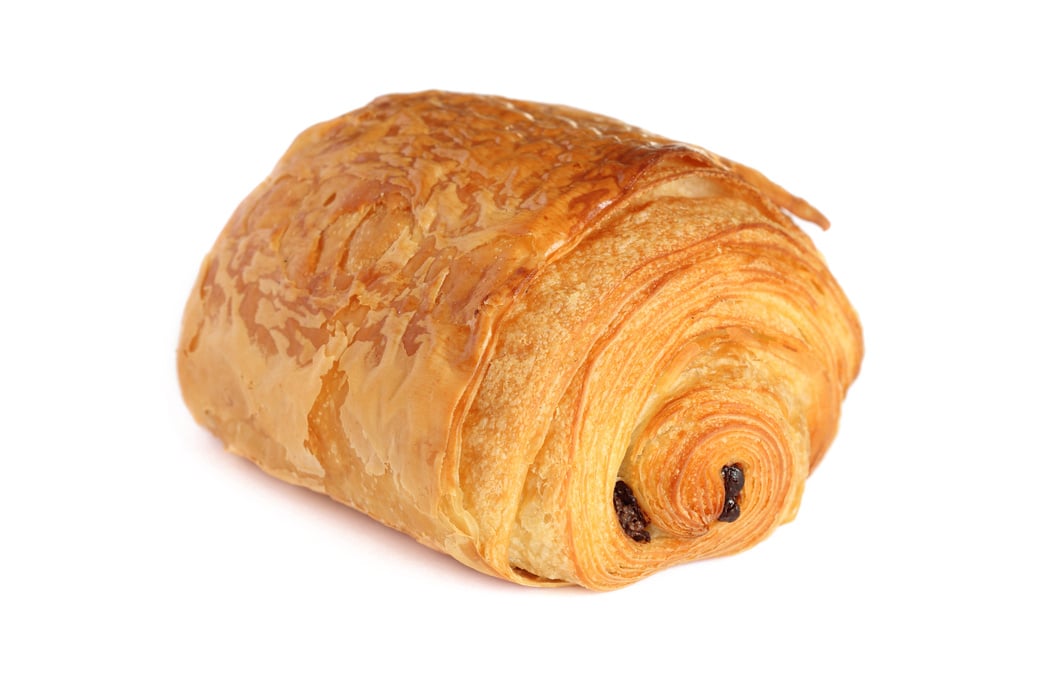 French croissant with chocolate named petit pain au chocolat on white background..